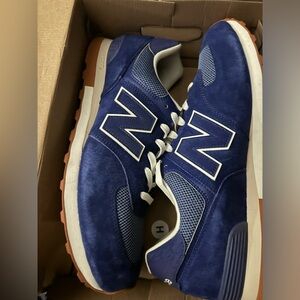 Men’s New Balance with box never worn
